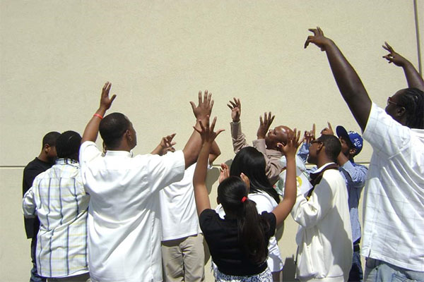 A group of people standing next to each other.